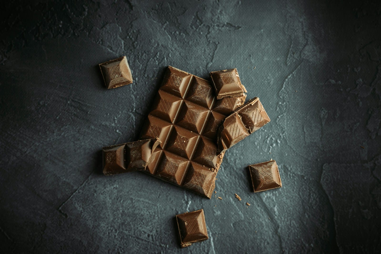 Photo by Tamas Pap brown wooden blocks on gray concrete floor
