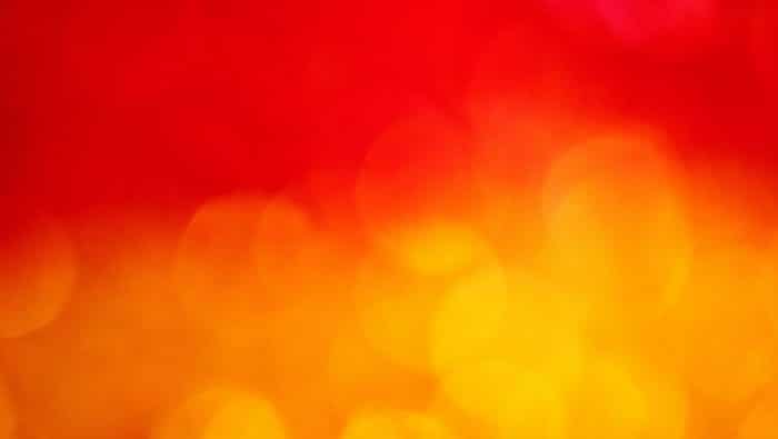 a blurry image of a red and yellow background