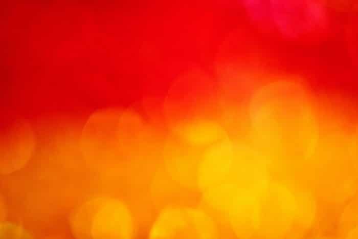 Canicule : les gestes à suivre et dispositifs existants à Lyon, Saint-Étienne, Roanne et Bourg-en-Bresse 1 a blurry image of a red and yellow background